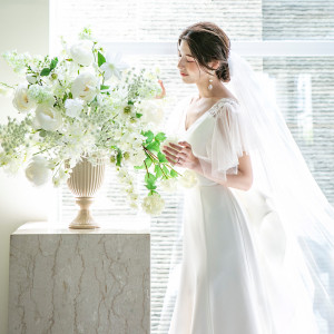 日の光が新婦様を優しく照らします|ノートルダム八戸/FIVESTAR WEDDINGの写真(33662435)