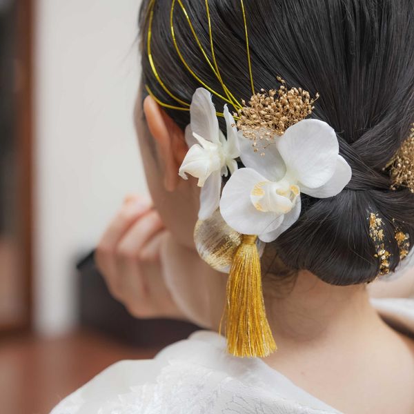 経験豊富なヘアメイクアーティストが花嫁様の魅力を引き出します|御料理　万る山（国登録有形文化財）の写真(56610571)