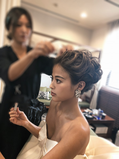 佐野真依子さんのヘアメイクの写真