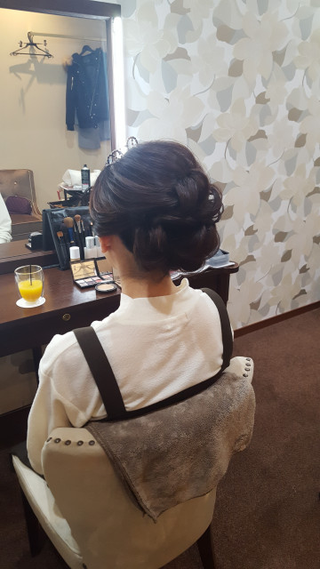 ゆるみかんさんのヘアメイクの写真