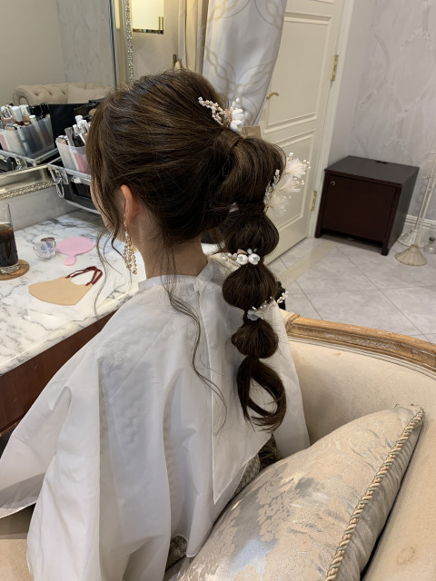 幸せ者さんのヘアメイクの写真