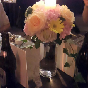 キャンドルサービスと卓上装花|450745さんのPARK WESTON HOTEL&WEDDING（パークウエストン ホテル&ウエディング）の写真(402473)