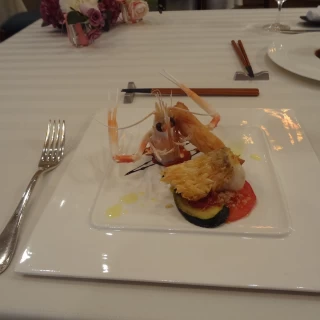 試食の魚料理。香ばしくておいしかったです。