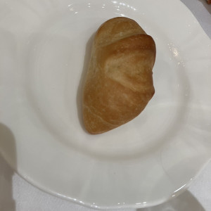 付け合わせのパンです。温かくて美味しい。|545167さんのアルモニーアンブラッセ イットハウスの写真(2003048)