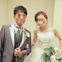 ブーケとブートニアは新郎新婦で色合いを合わせて