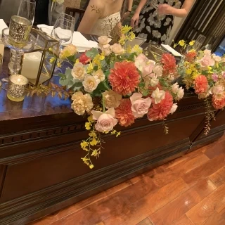 オレンジの装花かわいかった