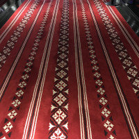 廊下の絨毯は博多織をイメージしています。