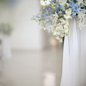 装花がリゾートらしい色合いで可愛かったです。|602623さんのシー シェル ブルー／サザンビーチホテル＆リゾート●小さな結婚式の写真(1338471)