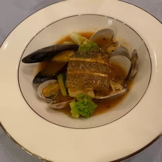 鱸のグリエと浅利・ムール貝京都産玄米のそばがゆ