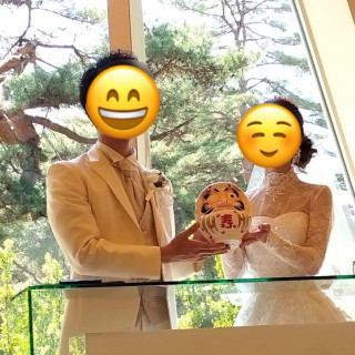 結婚証明書への署名の代わりに、だるまの目入れをしました。