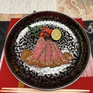 料理。お肉。ワンランク上げました。