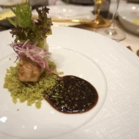 ふぐのソテー 若菜色のクスクスとバルサミコソース