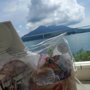 アフターセレモニーの折り鶴シャワー|715617さんのTHE BAYSUITE SAKURAJIMA TERRACE（ザベイスイートサクラジマテラス）の写真(2536142)
