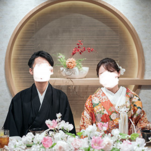 高砂席の装花の前で撮影|718763さんの桜鶴苑の写真(2464834)