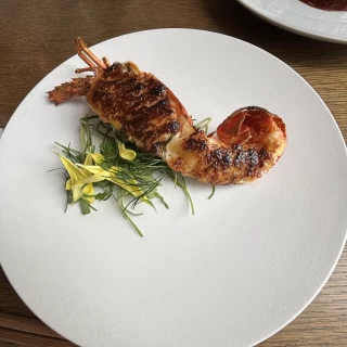 グラタン風の魚介料理
