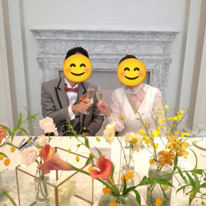 オレンジ系の明るいイメージで装花を選びました|754643さんのベイサイド迎賓館（神戸）/テイクアンドギヴ・ニーズウェディングの写真(2473158)