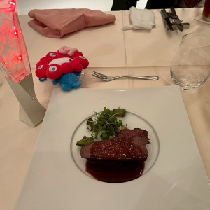 料理と必死に万博で買ったキティちゃんミャクミャク|777142さんのアルモニーアンブラッセ ウェディングホテル/テイクアンドギヴ・ニーズウェディングの写真(2569110)