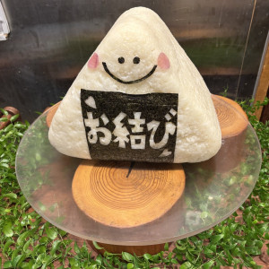 ケーキ入刀ではなく おむすびにしゃもじ入刀|783404さんのラ・クラリエールの写真(2608594)