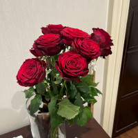 挙式で使用したダーズンローズの花束です。