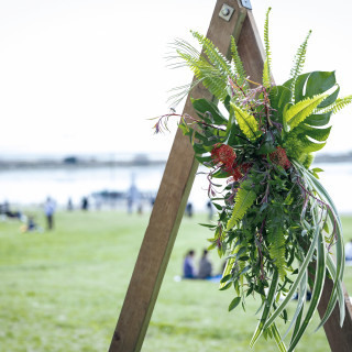 披露宴会場の装飾と合わせた装花にしてもらいました。