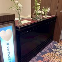 披露宴会場と同じテーマで受付装花を依頼しました